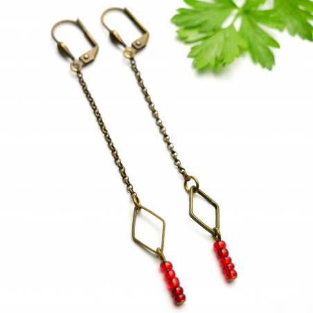 Lange Ohrringe mit rote Glasperlen aus gealteter Bronze Basic 25,00 €