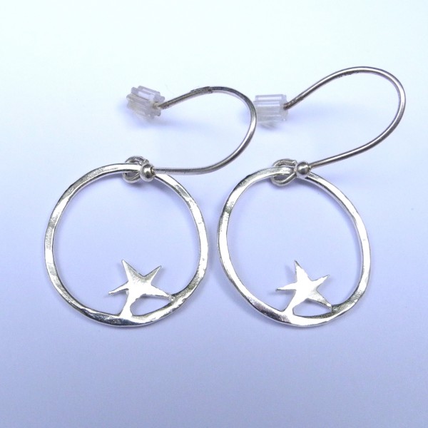 Boucles d'oreilles pendantes pour femme étoile Nova en argent faites main