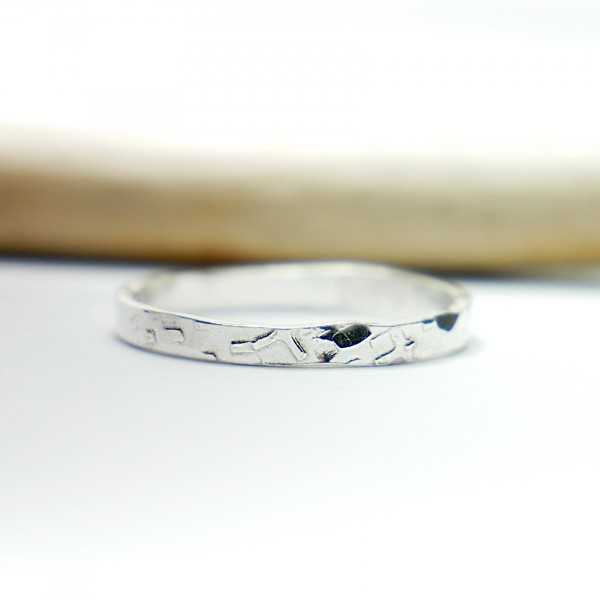 Textured wedding ring in...