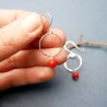Minimalist round dangling earrings with a small red glass bead in upcycled and recycled 925 silver ♻ for women.