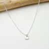 Women's small solitary heart pendant in minimalist recycled 925 silver for women on a fine adjustable chain