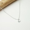 Women's small solitary heart pendant in minimalist recycled 925 silver for women on a fine adjustable chain